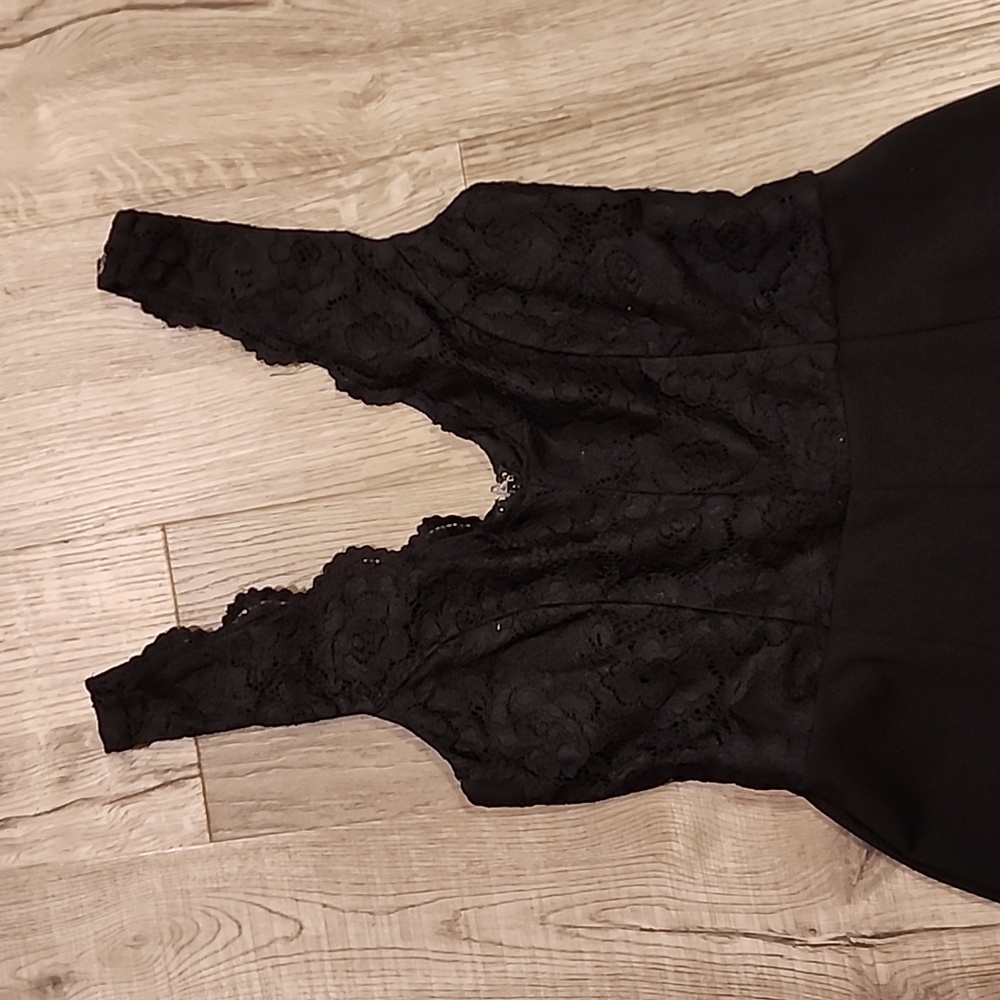 Black jumpsuit with lacy top